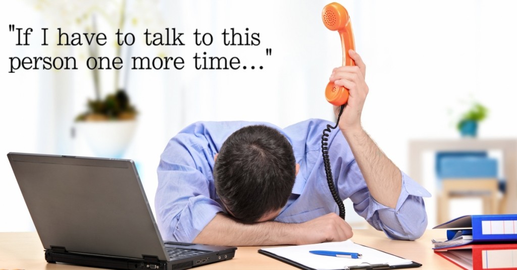 Frustrated-man-telephone-text_shutterstock_109983080